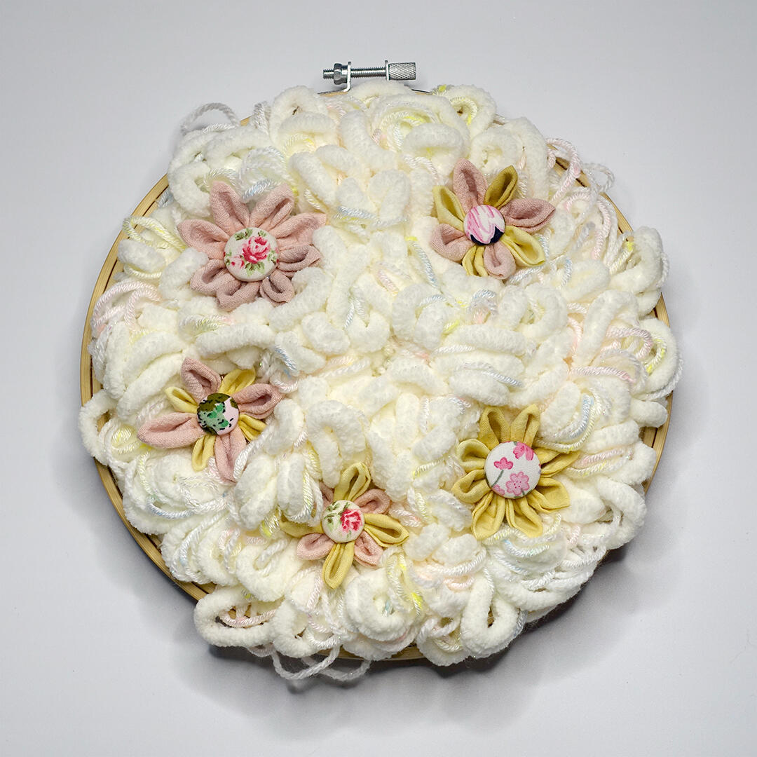 Flowering Patch 1 - Yarn, embroidery hoop, naturally dyed textile and buttons - 8 inches diameter - 2022 for "Beneath the Common Surface", Kaida Contemporary